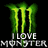 Green stylized 'M' with yellow highlights above white pixelated text reading "I LOVE MONSTER" on black background.