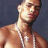 Static pixelated image of a shirtless man with light skin tone, dark hair, and visible facial features against a solid blue background.