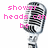 Pixelated vintage microphone images with pink text overlay reading "shower heads can microphones be the best" on a white background.