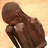A static image with a child-like figure and text promoting free rice donation
