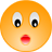 Two orange circular faces with red lips; left face has wide eyes, right face has half-closed eyes.