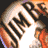 A pixelated image with a microphone, orange and gray background, and white text reading "Show me the JIM BEAM! CHAD LaMARSH .COM".