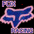 Pixelated icon with 'FOX' text above a stylized blue and pink fox head, 'RACING' below on black background.