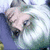 Pixelated anime-style character with white hair and blue eyes, holding a blue gem, next to text reading 'Cazdenacht' on black background.