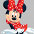 Pixelated image of a cartoon character with large black ears, red polka-dot bow, and matching scarf against gray background.