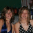 Green background with pixelated text and a small photo of two women in the top-left corner.