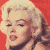 Pixelated of repeated Marilyn Monroe portraits on red background with vertical white lines
