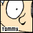 A pixelated cartoon face with large white eyes and a beige background, featuring the text "TOMMY" in a black-and-white box at the bottom.