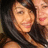 Two people in close proximity, one with dark hair and light skin, the other with lighter hair and pink lips, both in a pixelated static image.