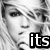 Black-and-white image of a person with flowing hair, featuring two text overlays reading 'itsbritney' and 'bitch!' in bold pixelated font.