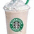 Pixelated image of a light brown beverage in a clear plastic cup with whipped cream and a green straw, featuring the Starbucks logo on the cup.