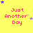 Yellow background with red text "Just Another Day" and small blue/purple/gold stars in various positions across the