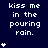 Dark blue background with white pixelated text reading 'kiss me in the pouring rain.' and multiple small white star icons arranged vertically on left, center, and right sides.
