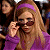 A pixelated contact sheet showing two frames of an animated icon featuring a woman with long blonde hair wearing sunglasses and a purple headband, next to green text reading "Original Icons .com" on a dark background.