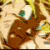 A pixelated anime-style character with brown hair and green eyes appears in a of , showing slight variations
