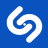 A white spiral symbol on a solid blue background, rendered with pixelated edges and a soft blur effect.