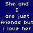 Blue background with white pixelated text reading "She and I are just friends but i love her" in two identical vertical