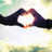 Animated icon shows hands forming a heart shape with sunburst, transitioning to peace sign with 'PEACE' text and silhouettes on grass.