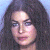 A 50x50 pixel animated contact sheet showing four frames of a celebrity mugshot-style icon with green text overlays and height markers on a gray background.