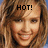 Pixelated close-up of a smiling person with light brown hair, overlaid text 'HOT!' in bold black letters.