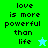 Green and cyan pixelated text displays 'love is more powerful than life' with a star icon, transitioning between two color schemes.