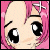 Pixelated close-up of a character's face with large black eyes, pink hair, and a small white star on the forehead against a pink background.