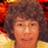 Pixelated image of a person with curly brown hair and light skin, next to yellow background with black text reading "Look How Ugly He Is!".