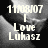 Pixelated grayscale image with white text reading 'I AM NOT I Love Lukasi' over a blurred background.