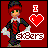 Pixel art buddy icon featuring a stylized character with red hair and green eyes against a solid red background, accompanied by "I ❤️" text and the word "skaters" in pixelated lettering.