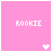 A 4x3 contact sheet of pixelated pink icons with white text variations and small heart symbols, each frame showing a different spelling variant of 'brookie' or similar wordplay.