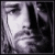 A pixelated grayscale image of a stylized face with high-contrast lighting and abstract geometric shapes, appearing as a static buddy icon.