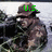 A pixelated image of a soldier in camouflage uniform and helmet with green text labels changing across frames.