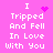Pixelated pink background with white text reading "I Tripped And Fell In Love With You" and animated purple heart or sparkle effects.