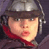 Static pixelated icon of a person wearing a helmet and red scarf against dark background