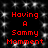 Red pixelated text reading "Having A Sammy Mommont" on a black background with white speckles, displayed in two identical vertical