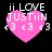 Four identical pixelated pink heart icons with white text and symbols on black background, each displaying 'ii.LOVE JUSTiIN' above three '<3' symbols.