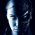 A 512x512 contact sheet of three animated frames from a Terminator-themed buddy icon, showing close-ups of a robotic face and an eye with blue highlights against dark backgrounds.