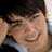Pixelated image of a person with dark hair smiling, next to bold pink text on black background reading 'I LUV YOU JOE JONAS!!!!!!'