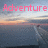 Pixelated image with pink text 'Adventure' over a gradient background transitioning from blue to orange and gray tones.