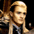 Four 50x50 pixel frames of an animated buddy icon showing a character with long blonde hair in different poses and expressions against dark or light backgrounds.