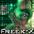 Pixelated green-toned image of a person with dark hair and green eyes, wearing a brown top, with text reading "FREEK" at the bottom.