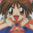 Anime-style character with brown hair and large eyes, wearing a blue and red outfit, hands near face, next to black background with white text.