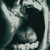 A black-and-white animated sequence showing a person's face in six distinct expressions of screaming, from wide-open mouth to clenched teeth.
