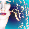 Static 100x100 pixel buddy icon featuring a stylized close-up of a woman's face with red lips and dark hair against a blue background, overlaid with ornate golden decorative patterns.