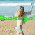 A woman in a white top and light blue shorts appears on a beach with green text overlay, then transitions to sitting by a car, followed by kicking near water.