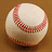 A static pixelated image of a baseball with red stitching on a brown background.