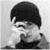 Black-and-white pixelated image with split composition showing partial faces and bold text "Billy Boy" on right side.