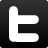 A pixelated white 'T' shape on a black background with subtle gray gradients at the edges.
