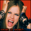 A four- shows a person with long brown hair against a red background, hands gripping hair, mouth open in a scream, wearing black wristbands with silver studs