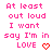 Pixelated pink text on white background reads 'At least out loud I want say I'm in LOVE' with a red heart symbol, two identical versions side-by-side.